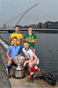 23 July 2014; In attendance at the launch of 2014 GAA Football Championship All-Ireland Series are, from top left, Karl Lacey, Donegal, James O'Donoghue, Kerry, Robert Hennelly, Mayo, and Jonny Cooper, Dublin, and the Sam Maguire Cup. Sir John Rogerson's Quay, Dublin Picture credit: Brendan Moran / SPORTSFILE