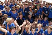 23 July 2014; Leinster players Tom Denton and Jamie Heaslip with kids from The Herald Leinster Rugby Summer Camps in Seapoint RFC, Killiney, Co. Dublin. Picture credit: Matt Browne / SPORTSFILE