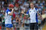 22 July 2014; Waterford manager Derek Lyons, right, and Darragh Lyons before the game. Electric Ireland Munster GAA Hurling Minor Championship Final Replay, Waterford v Limerick, Semple Stadium, Thurles, Co. Tipperary. Picture credit: Diarmuid Greene / SPORTSFILE