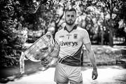 23 July 2014; (Editors please note; This black & white image has been created from an original colour file) In attendance at the launch of 2014 GAA Football Championship All-Ireland Series is Robert Hennelly, Mayo, with the Sam Maguire Cup. St Stephen's Green, Dublin. Picture credit: Brendan Moran / SPORTSFILE