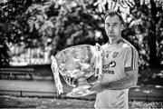 23 July 2014; (Editors please note; This black & white image has been created from an original colour file) In attendance at the launch of 2014 GAA Football Championship All-Ireland Series is Karl Lacey, Donegal, with the Sam Maguire Cup. St Stephen's Green, Dublin. Picture credit: Brendan Moran / SPORTSFILE