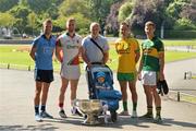 23 July 2014; Inter county players Jonny Cooper, Dublin, Robert Hennelly, Mayo, Karl Lacey, Donegal, and James O'Donoghue, Kerry, with Donal Foley, 21 months, and his dad, Daniel, from Ardsallagh, Dundalk, Co. Louth, as they stroll through St. Stephen's Green on their way to the  launch of the 2014 GAA Football Championship All-Ireland Series. St. Stephen's Green, Dublin. Picture credit: Ray McManus / SPORTSFILE