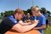 23 July 2014; Aran Daily gets an autograph from Leinster player Tom Denton during The Herald Leinster Rugby Summer Camps in Seapoint RFC, Killiney, Co. Dublin. Picture credit: Matt Browne / SPORTSFILE