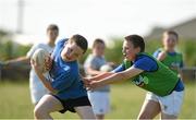 23 July 2014; William Whelan is tackled by Jamie Doyle during The Herald Leinster Rugby Summer Camps in Tullow RFC, Tullow, Co. Carlow. Picture credit: Matt Browne / SPORTSFILE