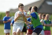 23 July 2014; Cian Byrne is tackled by James Whelan during The Herald Leinster Rugby Summer Camps in Tullow RFC, Tullow, Co. Carlow. Picture credit: Matt Browne / SPORTSFILE
