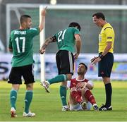 23 July 2014; Iica Vrdoljak, Legia Warszawac, clashes with Greg Bolger, St Patrick's Athletic, as referee Andreas Ekberb looks on. UEFA Champions League, Second Qualifying Round, Second Leg, St Patrick's Athletic v Legia Warszawa, Tallaght Stadium, Tallaght, Co. Dublin. Picture credit: David Maher / SPORTSFILE
