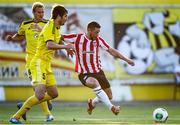 24 July 2014; Rory Patterson, Derry City, in action against Aleksei Yanushkevich, Shakhtyor Soligorsk. UEFA Champions League, Second Qualifying Round, Second Leg, Shakhtyor Soligorsk v Derry City, Stroitel Stadium, Soligorsk, Belarus. Picture credit: Tatiana Zenkovich / SPORTSFILE