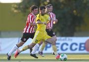 24 July 2014; Artem Stargorodsky, Shakhtyor Soligorsk, in action against Barry McNamee, Derry City. UEFA Champions League, Second Qualifying Round, Second Leg, Shakhtyor Soligorsk v Derry City, Stroitel Stadium, Soligorsk, Belarus. Picture credit: Tatiana Zenkovich / SPORTSFILE