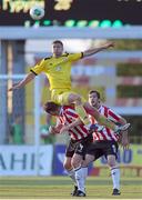 24 July 2014; Nikolai Yanush, Shakhtyor Soligorsk, in action against Barry Molloy and Ryan McBride, behind, Derry City. UEFA Champions League, Second Qualifying Round, Second Leg, Shakhtyor Soligorsk v Derry City, Stroitel Stadium, Soligorsk, Belarus. Picture credit: Tatiana Zenkovich / SPORTSFILE