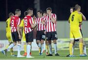 24 July 2014; Derry City and Shakhtyor Soligorsk players after the game. UEFA Champions League, Second Qualifying Round, Second Leg, Shakhtyor Soligorsk v Derry City, Stroitel Stadium, Soligorsk, Belarus. Picture credit: Tatiana Zenkovich / SPORTSFILE