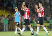 24 July 2014; Derry City players, from left, Joshua Tracey, Barry McNamee and Cliff Byrne applaud supporters after the game. UEFA Champions League, Second Qualifying Round, Second Leg, Shakhtyor Soligorsk v Derry City, Stroitel Stadium, Soligorsk, Belarus. Picture credit: Tatiana Zenkovich / SPORTSFILE