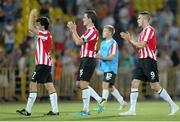 24 July 2014; Derry City players, from left, Barry McNamee, Cliff Byrne, Joshua Tracey and Patrick McEleney applaud supporters after the game. UEFA Champions League, Second Qualifying Round, Second Leg, Shakhtyor Soligorsk v Derry City, Stroitel Stadium, Soligorsk, Belarus. Picture credit: Tatiana Zenkovich / SPORTSFILE