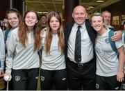 25 July 2014; Republic of Ireland coach David Connell with players, from left to right, Lauren Dwyer, Clare Shine and Savannah McCarthy on their return to Dublin following the UEFA U19 Women's European Championship Finals. Dublin Airport, Dublin. Picture credit: Ramsey Cardy / SPORTSFILE