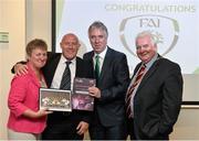 25 July 2014; Republic of Ireland coach David Connell, second from left, with, from left to right, Chairperson WFAI Niamh O'Donoghue, Chief Executive of the FAI John Delaney and Deputy Lord Mayor of Dublin Larry O'Tool, at a welcome reception, after the squad's return to Dublin following the UEFA U19 Women's European Championship Finals. Dublin Airport, Dublin. Picture credit: Ramsey Cardy / SPORTSFILE