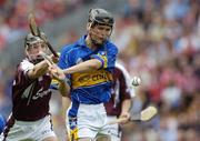 3 September 2006; Thomas McGrath, Tipperary, is hooked by Galway's Aidan Moylan. ESB All-Ireland Minor Hurling Championship Final, Galway v Tipperary, Croke Park, Dublin. Picture credit: Ray McManus / SPORTSFILE