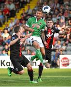 25 July 2014; John O'Flynn, Cork City, in action against Derek Pender, left, and Roberto Lopes, Bohemians. SSE Airtricity League Premier Division, Bohemians v Cork City. Dalymount Park, Dublin. Picture credit: Ramsey Cardy / SPORTSFILE