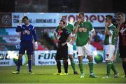 25 July 2014; Players from both sides look on following an injury to Cork City's Brian Lenihan. SSE Airtricity League Premier Division, Bohemians v Cork City. Dalymount Park, Dublin. Picture credit: Cody Glenn / SPORTSFILE