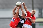 26 July 2014; Aidan Walsh, Cork, left, supported by teammate Michael Shields, contests a high ball with Pat Hughes, Sligo. GAA Football All Ireland Senior Championship, Round 4A, Cork v Sligo. O'Connor Park, Tullamore, Co. Offaly. Picture credit: Ramsey Cardy / SPORTSFILE