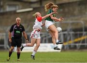 26 July 2014; Roisin Byrne, Kildare, in action against Neamh Woods, Tyrone. TG4 All-Ireland Ladies Football Senior Championship, Round 1 Qualifier, Kildare v Tyrone. Páirc Táilteann, Navan, Co. Meath. Photo by Sportsfile