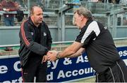 26 July 2014; Sligo manager Pat Flanagan shakes the hand of Cork manager Brian Cuthbert after the match. GAA Football All Ireland Senior Championship, Round 4A, Cork v Sligo. O'Connor Park, Tullamore, Co. Offaly. Picture credit: Ramsey Cardy / SPORTSFILE