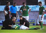 25 July 2014; Brian Lenihan, Cork City, receives treatment following an injury during the game. SSE Airtricity League Premier Division, Bohemians v Cork City. Dalymount Park, Dublin. Picture credit: Cody Glenn / SPORTSFILE