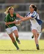 26 July 2014; Shauna Bennett, Meath, in action against Rosie Crowe, Cavan. TG4 All-Ireland Ladies Football Senior Championship, Round 1 Qualifier, Cavan v Meath. Páirc Táilteann, Navan, Co. Meath. Photo by Sportsfile