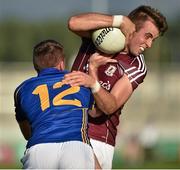 26 July 2014; Paul Conroy, Galway, in action against Peter Acheson, Tipperary. GAA Football All Ireland Senior Championship, Round 4A, Galway v Tipperary. O'Connor Park, Tullamore, Co. Offaly. Picture credit: Barry Cregg / SPORTSFILE