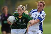 26 July 2014; Jenny Rispin, Meath, in action against Emma McDermott, Cavan. TG4 All-Ireland Ladies Football Senior Championship, Round 1 Qualifier, Cavan v Meath. Páirc Táilteann, Navan, Co. Meath. Photo by Sportsfile