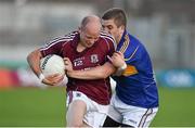 26 July 2014; James Kavanagh, Galway, in action against Robbie Kiely, Tipperary. GAA Football All Ireland Senior Championship, Round 4A, Galway v Tipperary. O'Connor Park, Tullamore, Co. Offaly. Picture credit: Barry Cregg / SPORTSFILE