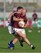 26 July 2014; James Kavanagh, Galway, in action against Philip Austin, Tipperary. GAA Football All Ireland Senior Championship, Round 4A, Galway v Tipperary. O'Connor Park, Tullamore, Co. Offaly. Picture credit: Barry Cregg / SPORTSFILE