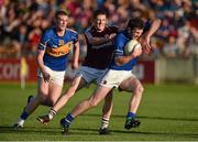 26 July 2014; Barry Grogan, Tipperary, with support from team-mate Ian Fahey, in action against Paul Varley, Galway. GAA Football All Ireland Senior Championship, Round 4A, Galway v Tipperary. O'Connor Park, Tullamore, Co. Offaly. Picture credit: Barry Cregg / SPORTSFILE