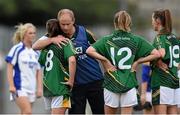 26 July 2014; Meath joint manager Lar Wall consoles captain Shauna Bennett after the game. TG4 All-Ireland Ladies Football Senior Championship, Round 1 Qualifier, Cavan v Meath. Páirc Táilteann, Navan, Co. Meath. Photo by Sportsfile