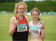 26 July 2014; Emma O'Brien, from Inbhear Dee AC, Wicklow Town, who won the Girls U16 800m with second place Rachael Browne, from Greystones & District AC, Co. Wicklow. GloHealth Juvenile Track and Field Championships, Tullamore Harriers AC, Tullamore, Co. Offaly. Picture credit: Matt Browne / SPORTSFILE