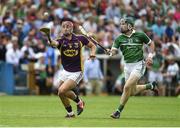 27 July 2014; Lee Chin, Wexford, in action against Thomas Ryan, Limerick. GAA Hurling All Ireland Senior Championship Quarter-Final, Limerick v Wexford. Semple Stadium, Thurles, Co. Tipperary.  Picture credit: Diarmuid Greene / SPORTSFILE