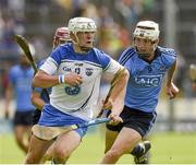 27 July 2014; Peter Hogan, Waterford, in action against Eoghan Conroy, Dublin. Electric Ireland GAA Hurling All Ireland Minor Championship Quarter-Final, Dublin v Waterford. Semple Stadium, Thurles, Co. Tipperary. Picture credit: Ray McManus / SPORTSFILE