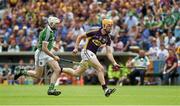 27 July 2014; Podge Doran, Wexford, in action against Tom Condon, Limerick. GAA Hurling All Ireland Senior Championship Quarter-Final, Limerick v Wexford. Semple Stadium, Thurles, Co. Tipperary. Picture credit: Ray McManus / SPORTSFILE