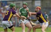 27 July 2014; Shane Dowling, Limerick, in action against Matthew O'Hanlon, left, and Richie Kehoe, Wexford. GAA Hurling All Ireland Senior Championship Quarter-Final, Limerick v Wexford. Semple Stadium, Thurles, Co. Tipperary. Picture credit: Ray McManus / SPORTSFILE