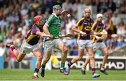 27 July 2014; Thomas Ryan, Limerick, in action against Lee Chin, Wexford. GAA Hurling All Ireland Senior Championship Quarter-Final, Limerick v Wexford. Semple Stadium, Thurles, Co. Tipperary. Picture credit: Diarmuid Greene / SPORTSFILE