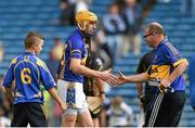 27 July 2014; Shane McGrath, Tipperary, is congratulated by supporters after the game, Dublin. GAA Hurling All Ireland Senior Championship Quarter-Final, Tipperary v Dublin. Semple Stadium, Thurles, Co. Tipperary. Picture credit: Diarmuid Greene / SPORTSFILE