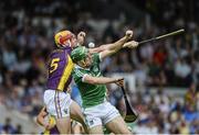 27 July 2014; Niall Moran, Limerick, in action against Andrew Shore, Wexford. GAA Hurling All Ireland Senior Championship Quarter-Final, Limerick v Wexford. Semple Stadium, Thurles, Co. Tipperary. Picture credit: Dáire Brennan / SPORTSFILE