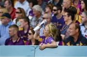 27 July 2014; A young Wexford supporter reacts during the game. GAA Hurling All Ireland Senior Championship Quarter-Final, Limerick v Wexford. Semple Stadium, Thurles, Co. Tipperary. Picture credit: Diarmuid Greene / SPORTSFILE