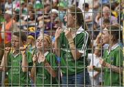 27 July 2014; Limerick supporters Jack Ryan, age 10, Róisín Maunsell, age 10, Amy O'Connor, age 12, and Molly Ryan, age 12, from Anglesboro, cheer on their team. GAA Hurling All Ireland Senior Championship Quarter-Final, Limerick v Wexford. Semple Stadium, Thurles, Co. Tipperary. Picture credit: Ray McManus / SPORTSFILE