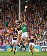 27 July 2014; James Ryan, Limerick, in action against Lee Chin, Wexford. GAA Hurling All Ireland Senior Championship Quarter-Final, Limerick v Wexford. Semple Stadium, Thurles, Co. Tipperary. Picture credit: Diarmuid Greene / SPORTSFILE