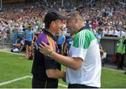 27 July 2014; Wexford manager Liam Dunne and Limerick manager TJ Ryan shake hands after the game. GAA Hurling All Ireland Senior Championship Quarter-Final, Limerick v Wexford. Semple Stadium, Thurles, Co. Tipperary. Picture credit: Dáire Brennan / SPORTSFILE