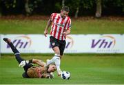 27 July 2014; Rory Patterson, Derry City, rounds UCD goalkeeper Conor O'Donnell to score his second and his sides sixth goal of the game. SSE Airtricity League Premier Division, UCD v Derry City. The UCD Bowl, UCD, Belfield, Dublin. Picture credit: Piaras Ó Mídheach / SPORTSFILE