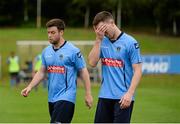 27 July 2014; UCD's James Kavanagh, right, and Gareth Matthews, leave the field dejected after the game. SSE Airtricity League Premier Division, UCD v Derry City. The UCD Bowl, UCD, Belfield, Dublin. Picture credit: Piaras Ó Mídheach / SPORTSFILE