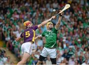 27 July 2014; David Breen, Limerick, in action against Andrew Shore, Wexford. GAA Hurling All Ireland Senior Championship Quarter-Final, Limerick v Wexford. Semple Stadium, Thurles, Co. Tipperary. Picture credit: Dáire Brennan / SPORTSFILE