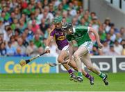 27 July 2014; Declan Hannon, Limerick, in action against Keith Rossiter, Wexford. GAA Hurling All Ireland Senior Championship Quarter-Final, Limerick v Wexford. Semple Stadium, Thurles, Co. Tipperary. Picture credit: Dáire Brennan / SPORTSFILE