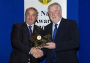 15 July 2006; Eamon O'Sullivan, Secretary of the Kerry County Board, receives their GAA MacNamee Special Merit award on behalf of the Kerry County Board for &quot;Eolaire - Information Booklet for GAA Officials and Supporters&quot; from GAA President Nickey Brennan at the 2006 GAA MacNamee awards. Burlington Hotel, Dublin. Picture credit: Brendan Moran / SPORTSFILE
