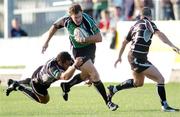 8 September 2006; Matt Mostyn, Connacht, is tackled by Sonny Parker, Ospreys. Magners Celtic League 2006 - 2007, Connacht v Ospreys, Sportsground, Galway. Picture credit; Ray Ryan / SPORTSFILE